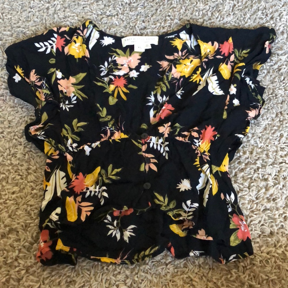 flowy floral ruffle tank with cinch waist and plunging v neck line